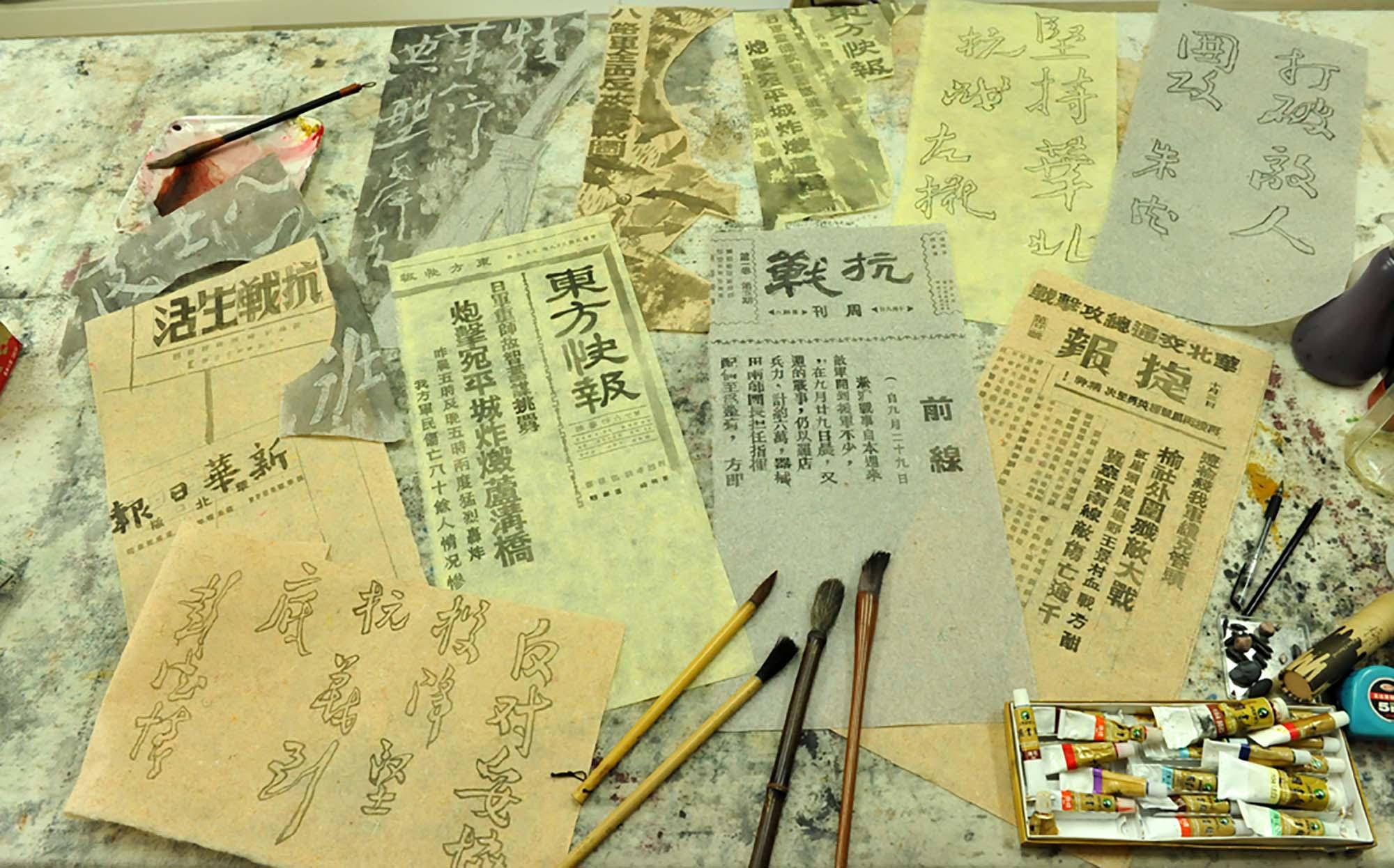 6. 初想抗战剪报加人像,后取消.jpg